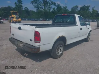 2004 Ford F-150 XL with VIN 2FTRF17204CA52584, listed as a IAAI auction lot 42545265 with 142,072 mi miles and . Bid and sale history available at DreamBid. Image 4.
