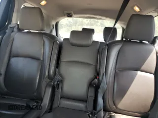 2019 Honda Odyssey Touring z VIN 5FNRL6H87KB098010, wystawiony jako Copart lot #54791505 z przebiegiem 94 477 mil mil oraz Szkoda całkowita • Salvage title. Historia ofert i sprzedaży dostępna na DreamBid. Obrazek 10.