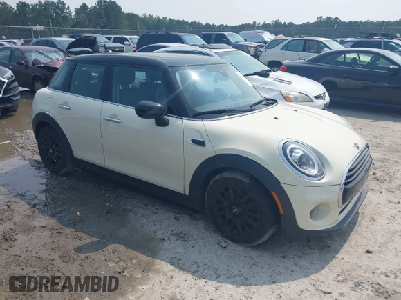 2020 MINI Hardtop 4 Door Cooper with VIN WMWXU7C01L2M54710, listed as a IAAI auction lot 42385956 with 55,714 mi miles and . Bid and sale history available at DreamBid. Image 1.