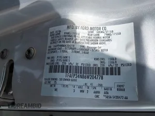 2006 Ford Focus S with VIN 1FAFP34N86W204778, listed as a IAAI auction lot 42128137 with 99,092 mi miles and . Bid and sale history available at carsss.com. Image 9.