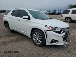 2020 Chevrolet Traverse High Country with VIN 1GNERNKW2LJ128319, listed as a Copart auction lot 79621524 with 83,590 mi miles and Salvage title. Bid and sale history available at DreamBid. Image 4.