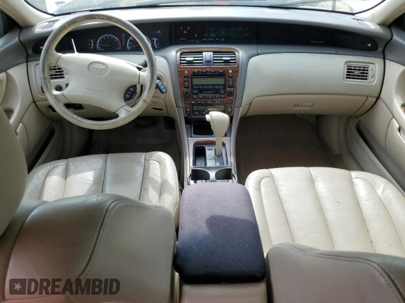 2001 Toyota Avalon XL z VIN 4T1BF28B91U155354, wystawiony jako Copart lot #52393885 z przebiegiem 277 545 mil mil oraz Szkody całkowita. Historia ofert i sprzedaży dostępna na DreamBid. Obrazek 8.