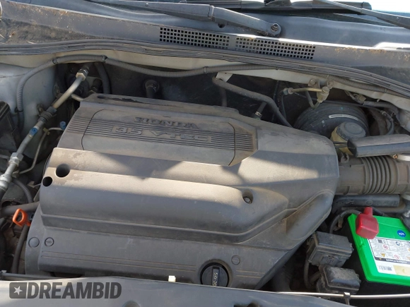 2004 Honda Odyssey EX-L with VIN 5FNRL18964B125664, listed as a IAAI auction lot 41531606 with 327,493 mi miles and . Bid and sale history available at DreamBid. Image 10.