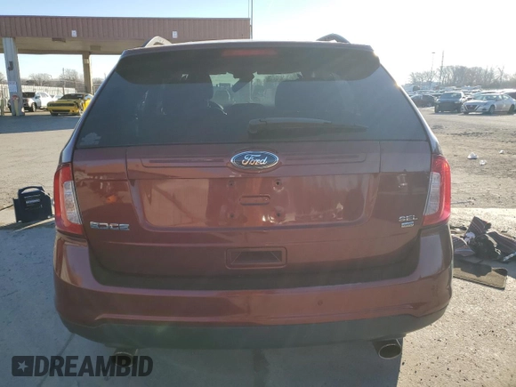 2014 Ford Edge SEL z VIN 2FMDK4JC3EBA68967, wystawiony jako Copart lot #42631625 z przebiegiem 166 302 mil mil oraz Szkody całkowita. Historia ofert i sprzedaży dostępna na DreamBid. Obrazek 6.