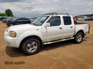 2001 Nissan Frontier SE z VIN 1N6ED27T21C305986, wystawiony jako Copart lot #59665065 z przebiegiem 201 540 mil mil oraz Czysty tytuł • Clean title. Historia ofert i sprzedaży dostępna na DreamBid. Obrazek 1.