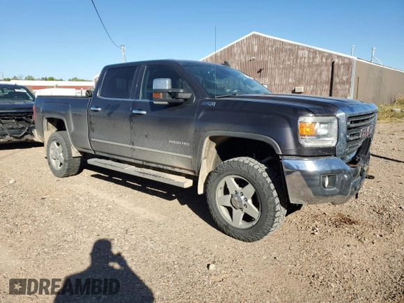2015 GMC Sierra 2500HD SLT with VIN 1GT12ZEG8FF552439, listed as a Copart auction lot 72850724 with 147,888 mi miles and Salvage title. Bid and sale history available at DreamBid. Image 4.