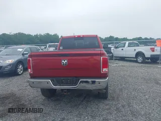 2014 Ram 2500 Laramie with VIN 3C6UR5NJ1EG276591, listed as a IAAI auction lot 42517879 with 145,466 mi miles and . Bid and sale history available at DreamBid. Image 16.