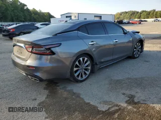 2023 Nissan Maxima Platinum with VIN 1N4AA6FV4PC505934, listed as a Copart auction lot 74889614 with 10,454 mi miles and Salvage title. Bid and sale history available at DreamBid. Image 3.