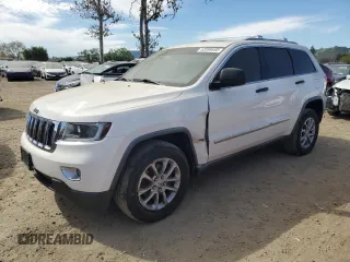2012 Jeep Grand Cherokee Laredo with VIN 1C4RJEAG0CC222943, listed as a Copart auction lot 52899545 with 153,389 mi miles and Salvage Title. Bid and sale history available at carsss.com. Image 1.