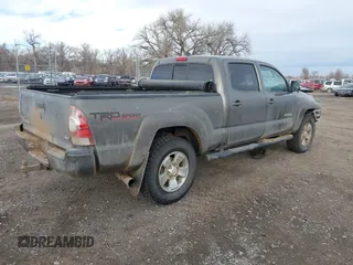 2014 Toyota Tacoma with VIN 3TMMU4FN7EM067182, listed as a IAAI auction lot 41108551 with 156,398 mi miles and . Bid and sale history available at DreamBid. Image 4.