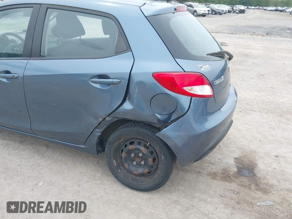2014 Mazda 2 Sport z VIN JM1DE1KZ2E0176480, wystawiony jako IAAI lot #42268767 z przebiegiem 32 194 mil mil oraz . Historia ofert i sprzedaży dostępna na DreamBid. Obrazek 6.