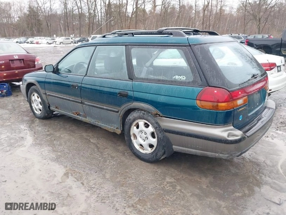 1997 Subaru Legacy Wagon Outback with VIN 4S3BG685XV7654378, listed as a IAAI auction lot 41666575 with 248,484 mi miles. Bid and sale history available at carsss.com. Image 3.