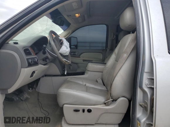 2012 GMC Sierra 2500HD SLT with VIN 1GT121E89CF112381, listed as a Copart auction lot 83098594 with 240,168 mi miles and Salvage title. Bid and sale history available at DreamBid. Image 7.