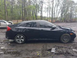 2019 Honda Civic LX with VIN 19XFC2F64KE041024, listed as a IAAI auction lot 42020159 with 36,870 mi miles and . Bid and sale history available at DreamBid. Image 13.