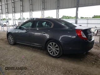 2016 Lincoln MKS z VIN 1LNHL9DK9GG601740, wystawiony jako Copart lot #60557565 z przebiegiem 89 350 mil mil oraz Szkoda całkowita • Salvage title. Historia ofert i sprzedaży dostępna na DreamBid. Obrazek 2.