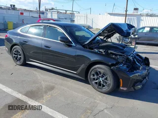 2024 BMW i4 eDrive35 z VIN WBY43AW00RFR88363, wystawiony jako IAAI lot #41758651 z przebiegiem 10 202 mil mil oraz . Historia ofert i sprzedaży dostępna na DreamBid. Obrazek 1.