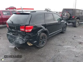 2020 Dodge Journey SE Value with VIN 3C4PDCAB3LT219272, listed as a IAAI auction lot 41541903 with 96,772 mi miles and . Bid and sale history available at carsss.com. Image 4.