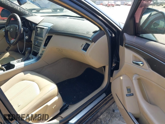 2009 Cadillac CTS RWD w/1SA with VIN 1G6DF577390128796, listed as a IAAI auction lot 42078153 with 257,757 mi miles. Bid and sale history available at carsss.com. Image 5.