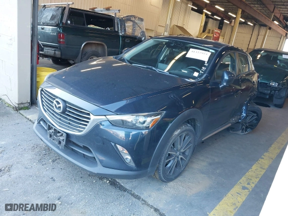 2018 Mazda CX-3 Grand Touring with VIN JM1DKFD77J0300612, listed as a IAAI auction lot 41322923 with 49,830 mi miles. Bid and sale history available at carsss.com. Image 2.