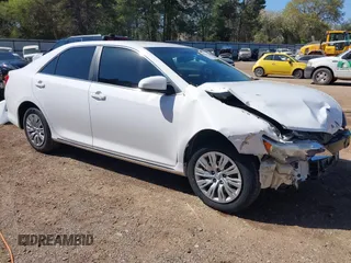 2014 Toyota Camry L with VIN 4T1BF1FK8EU381226, listed as a IAAI auction lot 41876832 with 79,025 mi miles and . Bid and sale history available at DreamBid. Image 1.
