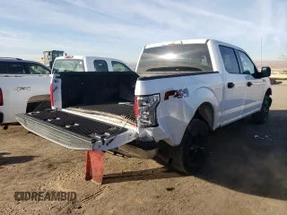 2019 Ford F-150 XL with VIN 1FTEW1E51KKE18332, listed as a Copart auction lot 86268344 with 141,566 mi miles and Salvage Title. Bid and sale history available at carsss.com. Image 3.