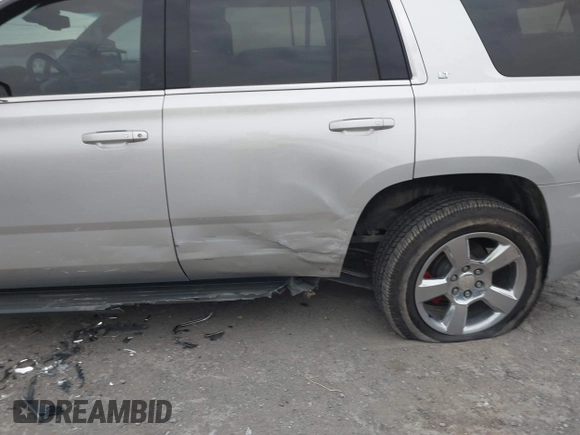 2017 Chevrolet Tahoe LT with VIN 1GNSKBKC4HR153369, listed as a IAAI auction lot 41689366 with 134,828 mi miles and . Bid and sale history available at DreamBid. Image 6.