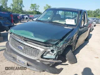 2000 Ford F-150 XL with VIN 1FTZF1720YNB20382, listed as a IAAI auction lot 42613663 with Not provided miles and . Bid and sale history available at DreamBid. Image 2.