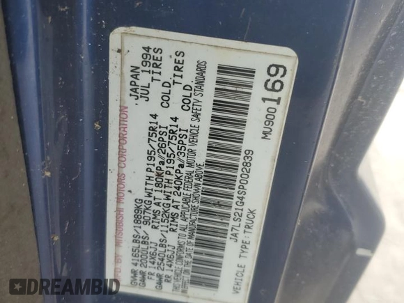 1995 Mitsubishi Mighty Max z VIN JA7LS21G4SP002839, wystawiony jako Copart lot #55777674 z przebiegiem Nie podano mil oraz Czysty tytuł • Clean title. Historia ofert i sprzedaży dostępna na DreamBid. Obrazek 13.