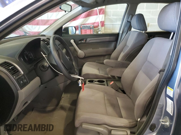 2007 Honda CR-V LX z VIN JHLRE383X7C040333, wystawiony jako Copart lot #57895475 z przebiegiem 124 156 mil mil oraz Szkoda całkowita • Salvage title. Historia ofert i sprzedaży dostępna na DreamBid. Obrazek 7.