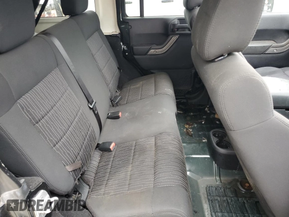 2012 Jeep Wrangler Unlimited Sport z VIN 1C4BJWDG3CL181596, wystawiony jako Copart lot #57940655 z przebiegiem 168 882 mil mil oraz Czysty tytuł • Clean title. Historia ofert i sprzedaży dostępna na DreamBid. Obrazek 10.