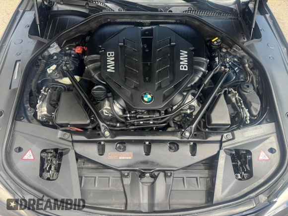 2015 BMW 7 Series 750i xDrive with VIN WBAYB6C5XFD965910, listed as a Copart auction lot 47488765 with 173,486 mi miles and Salvage Title. Bid and sale history available at carsss.com. Image 14.