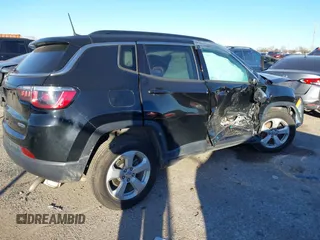 2019 Jeep Compass Latitude with VIN 3C4NJCBB1KT851846, listed as a IAAI auction lot 41219621 with 56,626 mi miles and . Bid and sale history available at DreamBid. Image 4.