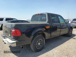 2003 Ford F-150 XLT with VIN 1FTRW07623KD82847, listed as a Copart auction lot 50303265 with 156,781 mi miles and Clean Title. Bid and sale history available at carsss.com. Image 3.