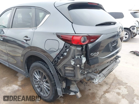 2021 Mazda CX-5 Touring with VIN JM3KFBCM0M0342210, listed as a IAAI auction lot 41236013 with 96,012 mi miles. Bid and sale history available at carsss.com. Image 18.