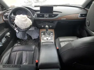 2016 Audi A7 3.0 Prestige with VIN WAU2GAFC9GN052829, listed as a Copart auction lot 39711603 with 103,284 mi miles. Bid and sale history available at carsss.com. Image 8.