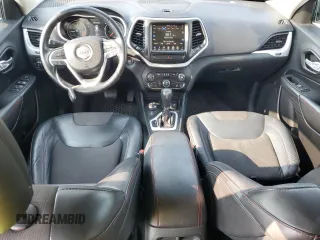 2015 Jeep Cherokee Trailhawk z VIN 1C4PJMBS2FW705132, wystawiony jako Copart lot #59884325 z przebiegiem 100 438 mil mil oraz Szkoda całkowita • Salvage title. Historia ofert i sprzedaży dostępna na DreamBid. Obrazek 8.
