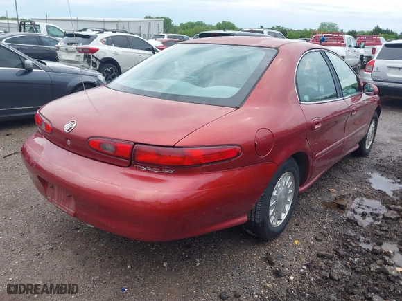 1999 Mercury Sable GS with VIN 1MEFM50UXXA649466, listed as a IAAI auction lot 42094811 with 122,644 mi miles. Bid and sale history available at carsss.com. Image 4.