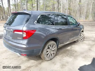 2022 Honda Pilot EX-L with VIN 5FNYF6H54NB009670, listed as a IAAI auction lot 41724302 with 32,690 mi miles. Bid and sale history available at carsss.com. Image 4.