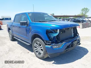 2023 Ford F-150 XL with VIN 1FTEW1EP0PKE27385, listed as a IAAI auction lot 42012648 with 8,938 mi miles and . Bid and sale history available at DreamBid. Image 1.