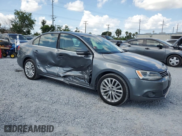 2014 Volkswagen Jetta TDI w/Premium with VIN 3VWLL7AJ7EM436916, listed as a Copart auction lot 58238385 with 103,265 mi miles and Salvage title. Bid and sale history available at DreamBid. Image 4.