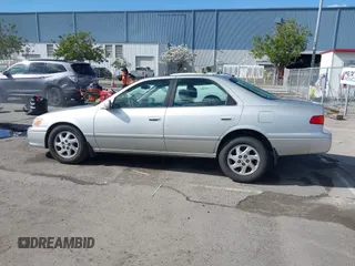 2001 Toyota Camry LE z VIN JT2BF22KX10342454, wystawiony jako IAAI lot #41939743 z przebiegiem 124 045 mil mil oraz . Historia ofert i sprzedaży dostępna na DreamBid. Obrazek 14.