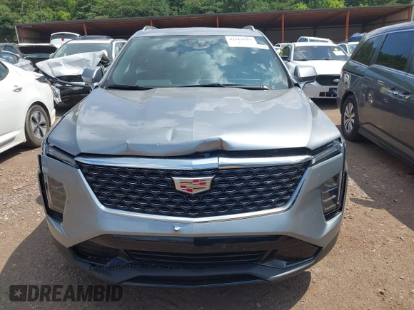 2025 Cadillac XT4 FWD Premium Luxury with VIN 1GYFZCR45SF128039, listed as a IAAI auction lot 42563517 with 18,478 mi miles and . Bid and sale history available at DreamBid. Image 12.