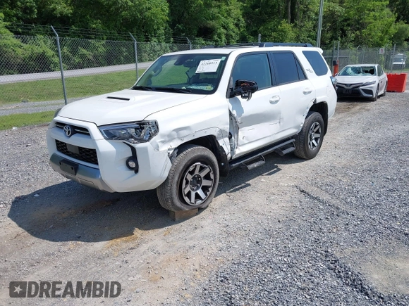 2021 Toyota 4Runner TRD Off Road Premium with VIN JTERU5JR5M5903979, listed as a IAAI auction lot 42268913 with 34,094 mi miles and . Bid and sale history available at DreamBid. Image 2.