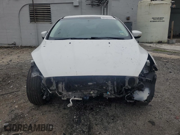 2015 Ford Focus SE with VIN 1FADP3F2XFL273662, listed as a Copart auction lot 60784435 with 32,115 mi miles and Salvage title. Bid and sale history available at DreamBid. Image 5.