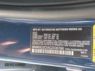 2016 MINI Cooper Hardtop 4 Door S with VIN WMWXU3C54G2D30766, listed as a IAAI auction lot 42008026 with 101,898 mi miles. Bid and sale history available at carsss.com. Image 9.
