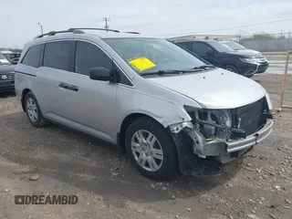 2013 Honda Odyssey LX with VIN 5FNRL5H22DB086503, listed as a IAAI auction lot 42133471 with 223,200 mi miles and . Bid and sale history available at carsss.com. Image 1.