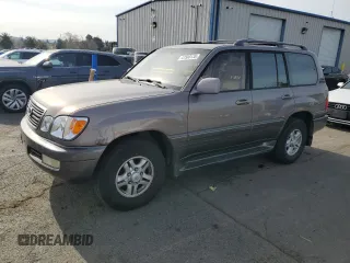 1998 Lexus LX 470 with VIN JT6HT00W0W0008257, listed as a Copart auction lot 47580135 with 369,756 mi miles and Salvage Title. Bid and sale history available at DreamBid. Image 1.