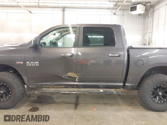 2015 Ram 1500 Big Horn with VIN 1C6RR7LTXFS656240, listed as a IAAI auction lot 41877628 with 148,136 mi miles and . Bid and sale history available at DreamBid. Image 14.
