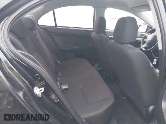 2014 Mitsubishi Lancer ES z VIN JA32U2FU7EU002071, wystawiony jako IAAI lot #42317104 z przebiegiem 159 858 mil mil oraz . Historia ofert i sprzedaży dostępna na DreamBid. Obrazek 8.