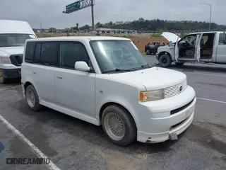 2006 Scion xB with VIN JTLKT324464048849, listed as a IAAI auction lot 42078493 with 242,835 mi miles. Bid and sale history available at carsss.com. Image 1.
